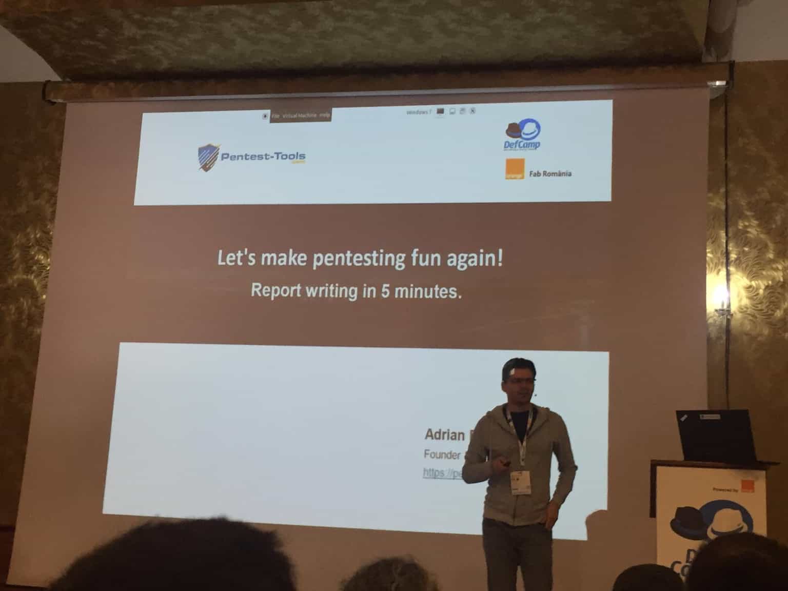 Adrian speaking at DefCamp conference about writing a pentest report faster